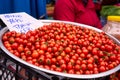 Closeup of red ripe cherry tomatoes at farmers market place Royalty Free Stock Photo