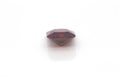 Closeup of a red ruby gemstone isolated on a white background Royalty Free Stock Photo