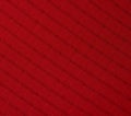 Closeup of Red Synthetic Fabric with Subtle Pattern Royalty Free Stock Photo