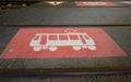 Closeup of red white old vintage tram car sign on asphalt between rails - Germany Royalty Free Stock Photo