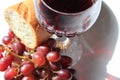 Closeup red wine, bread and grapes Royalty Free Stock Photo