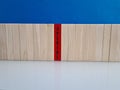 Closeup of red wooden stick is special and there are light cubes around Royalty Free Stock Photo