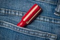 red wooden turn in blue jeans pocket Royalty Free Stock Photo