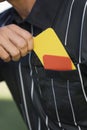 Closeup Of Referee Taking Card From Pocket