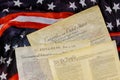 Close up of a replica of U.S. document of American constitution We the people with USA Flag Royalty Free Stock Photo