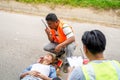 Closeup rescue workers using radio communication helping woman driver Royalty Free Stock Photo