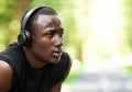 Closeup of resting african sportsman, woods background