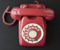 Retro red desktop telephone Royalty Free Stock Photo