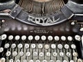 Closeup of retro typewriter in gray metal