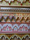 Closeup richly patterned multicoloured, handpainted Moroccan furniture