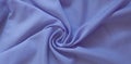 Closeup of rippled purple silk fabric, Beautiful and smooth silk background