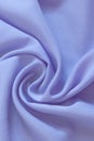 Closeup of rippled purple silk fabric, Beautiful and smooth silk background