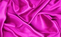 Closeup of rippled purple silk fabric