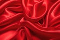 Closeup of rippled red silk satin fabric. Royalty Free Stock Photo
