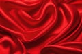 Closeup of rippled red silk satin fabric. Royalty Free Stock Photo