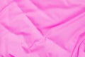 Closeup rippled soft pink fabric