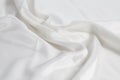 Closeup of rippled white silk fabric background Royalty Free Stock Photo