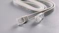 Closeup of rj45 cable on gray background Royalty Free Stock Photo