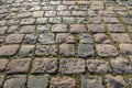 Closeup of a road paved with cobblestones Royalty Free Stock Photo