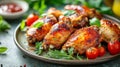Closeup of Roasted Chicken Wings with Tomatoes and Herbs Royalty Free Stock Photo