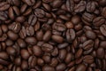 Closeup of roasted coffee beans background, brown coffee bean