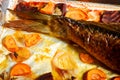 closeup roasted stuffed fish tail with vegetables Royalty Free Stock Photo