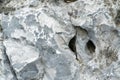 Closeup rock pattern with hole in nature