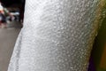 Closeup of a roll of bubble wrap with a blurry background Royalty Free Stock Photo