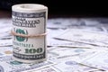 Closeup of rolled American dollar banknotes on the left side. Money background. Royalty Free Stock Photo