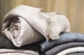 Closeup rolled beige cashmere woollen blanket Royalty Free Stock Photo