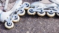 Closeup roller skates on asphalt.