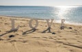 Romantic love sign on a tropical beach paradise Royalty Free Stock Photo