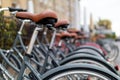 Closeup of the row of bicycles seats. Royalty Free Stock Photo