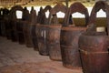 Closeup of a row of traditional vintage wooden buckets in a flea market