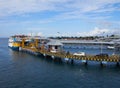 Closeup of rows of cars waiting in line to enter the ferry at Ketapang harbor, Indonesia