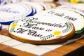 Closeup of rows of traditional round Mexican souvenirs with different writings