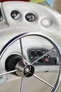 Closeup of rudder and chair in a luxury boat in black and white