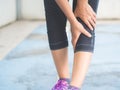 Closeup runner sport knee injury.