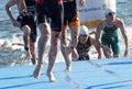 Closeup of the running legs of swimmers Royalty Free Stock Photo
