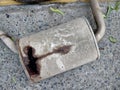 Rusted broken muffler of car silencer