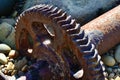 Closeup of rusty gear from old shipwreck along the coast of Gros Morne Royalty Free Stock Photo