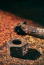 Rusty nut and bolt on a rusty surface Royalty Free Stock Photo