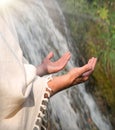 Man praying at the river Royalty Free Stock Photo