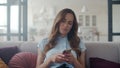 Closeup sad face woman reading phone message at home office. Sad emotion. Royalty Free Stock Photo