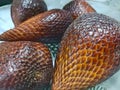 Closeup of Salak (Salacca Zalacca) or Snake Fruit, has scaly skin pattern details like the texture of snake skin