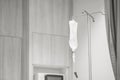 Closeup saline bag in hospital room background in black and white tone