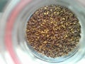 Closeup of salted flax seeds in a jar, food ingredients photography, healthcare