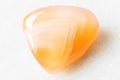 Polished Carnelian Cornelian rock on white Royalty Free Stock Photo