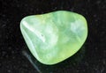 polished Prehnite rock on black Royalty Free Stock Photo