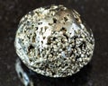 polished Pyrite (fool\'s gold) rock on black